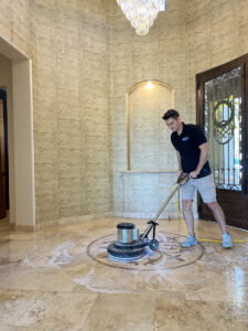 Benjamin Danecker of Grout Nurse, Cleaning a Stone Floor.